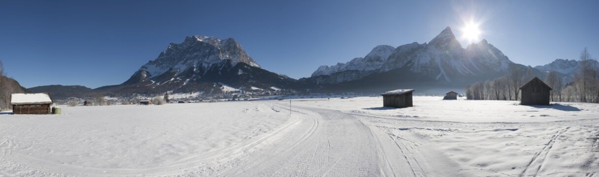View from Lermoos towards Zugspitze and Sonnenspitze mountains and the small town of Ehrwald, Tyrol, Austria, Europe