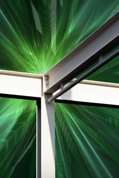 Steel beams against a green pattern, graphic