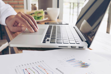 Businesswoman Using Laptop Computer in Office, Business Finance and Technology Concept