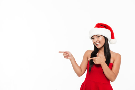 Portrait Of A Young Asian Woman In Red Christmas Costume