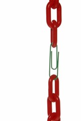 Paper clip joining two chains, symbolic image, weakest link