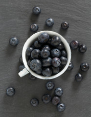 blueberries on stone board