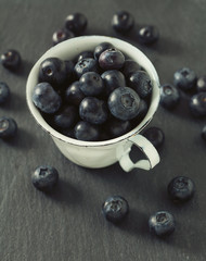 blueberries on stone board