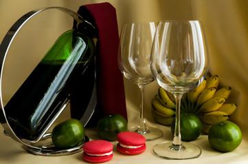 a glass of red wine and fruit