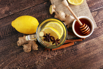 Cup of Ginger tea with lemon and honey.