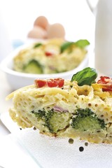 Pasta bake, macaroni-casserole with broccoli and chicken eggs
