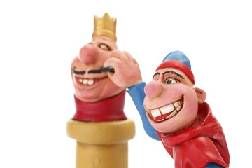 Cartoon character, the dissident, with a bust of the king © imageBROKER