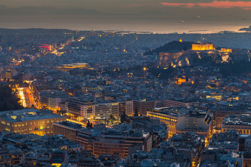 Panoramic view of Athens from the hill Likawitos at sunset, Greece
