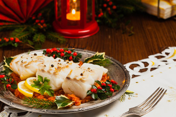 Christmas fish. Roasted cod pieces, served in vegetable sauce.
