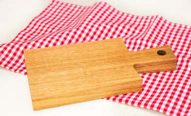 Board accessory with  checkered tablecloth 