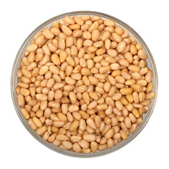Pine nuts in glass plate