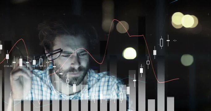 Digital generated video of graph and tired man working on computer 