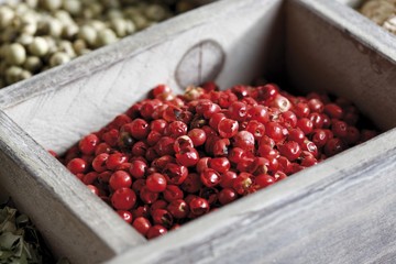 Spices in a case, pink pepper