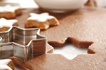 Cutting out cinnamon cookies