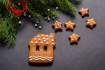 Obraz na płótnie Canvas Gingerbread cookies on black background, Christmas concept