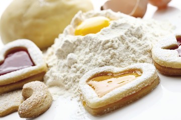 Pile of flour and an egg, Christmas cookies