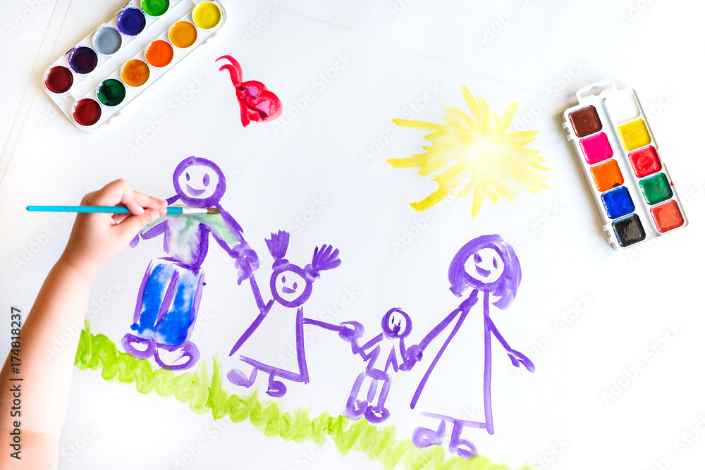 Wall mural Child's hand paints sketch of the family