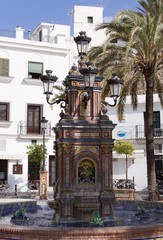 Fototapeta na wymiar Fountains at on the town hall square in the Andalusian village of Vejer, Spain, Europe