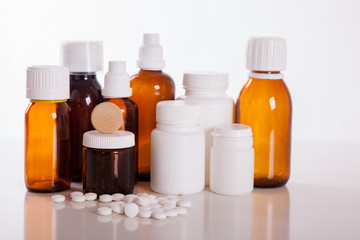 Medical pills and hot tea with lemon, treatment of colds, flu and runny.