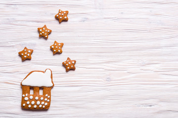 Gingerbread cookies on wooden background, Christmas concept