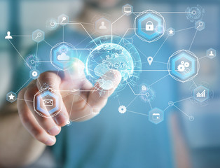 International business network connection displayed on a futuristic interface with technology icon and sphere globe - Worldwide business concept