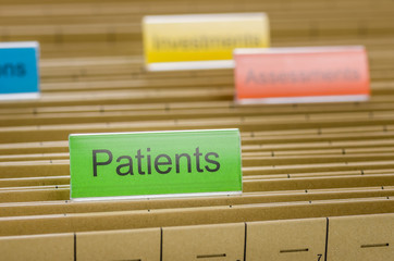 Hanging file folder labeled with Patients