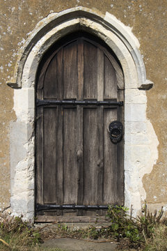 Old wooden door of Ramsholt church, Ramsholt, Suffolk, England