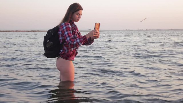 The girl on the shallow sea