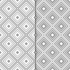 Gray and white geometric ornaments. Set of seamless patterns