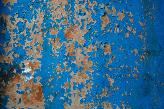 Old painted blue textured grungy wall