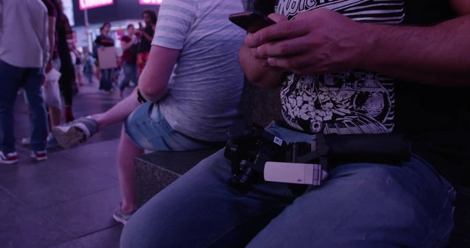 Anti social man texts on phone - New York city september 12 2017
