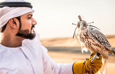 Arabic man in the desert with his hawk