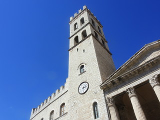 Fototapeta na wymiar Assisi, Italy, a Unesco world heritage. The palace called the captain of the people and the tower