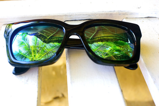 Sun glasses lying on a deckchair