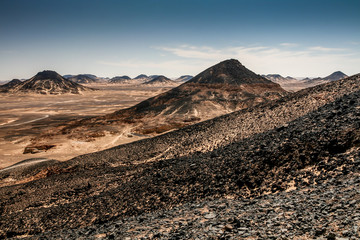 Volcanic Black desert between western oasis, Egypt