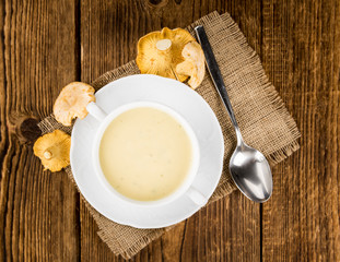 Creamy Chanterelle Soup close-up shot, selective focus