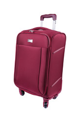 Red fabric suitcase isolated on white background.