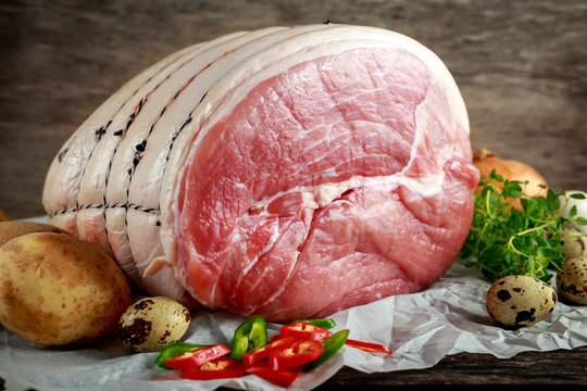 Raw whole green gammon a piece with vegetable and eggs.