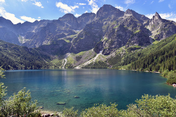 Green water of Morskie Oko lake in summer, Tatra Mountains, Poland - obrazy, fototapety, plakaty