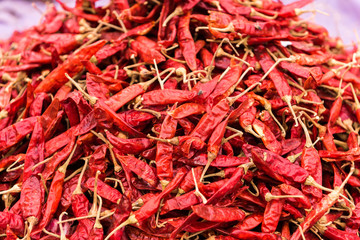 Fototapeta premium Red paprica in traditional vegetable market in India, Puttaparthi, Andhra Pradesh. Ñlose-up.