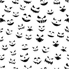 Seamless halloween pattern with pumpkin faces.