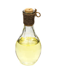 Natural soy bean oil with soybeans near it