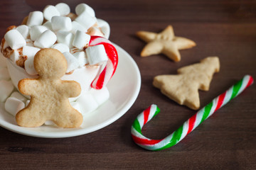 Coffee, Hot Cocoa, hot chocolate, cones, candy cane, ginger bread man, star. Winter, New Year, Christmas still life