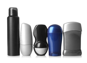 Various deodorants for men on white background