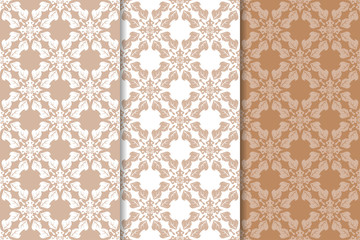 Set of floral ornaments. Brown, beige and white seamless patterns