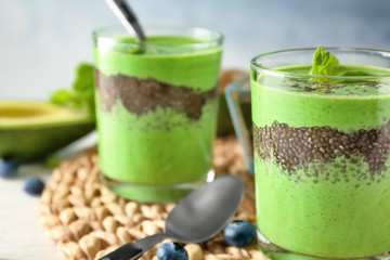 Smoothie with chia seeds in glass on table, closeup