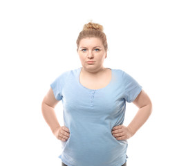 Overweight young woman on white background. Weight loss concept