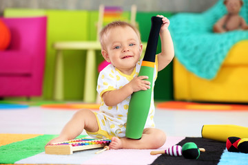 Cute little baby playing at home