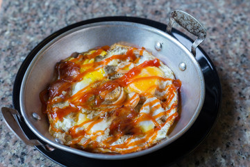 Easy menu, pan-fried eggs with toppings ,Thai style (close up)