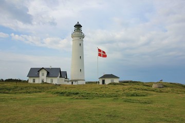 Fototapeta na wymiar Old lighthouse in Hirtshals, Denmark. Scene at the west coast.